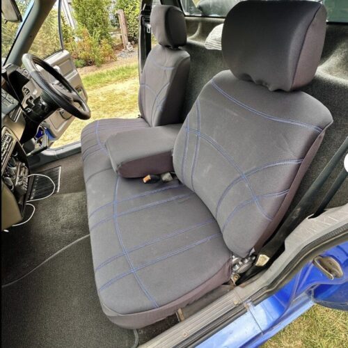 Seat covers fitted to a Ford Falcon