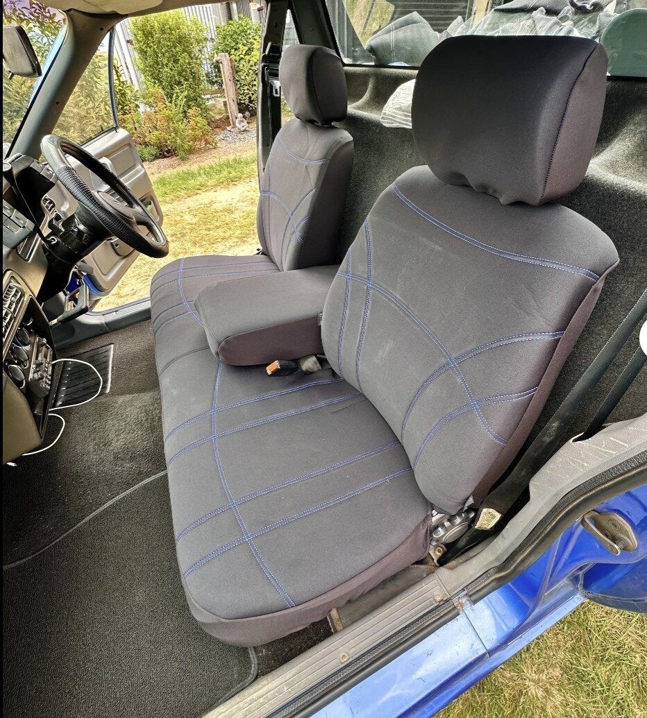 Seat covers fitted to a Ford Falcon
