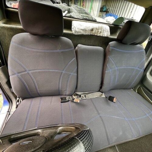 Neoprene seat covers fitted to a Ford Falcon
