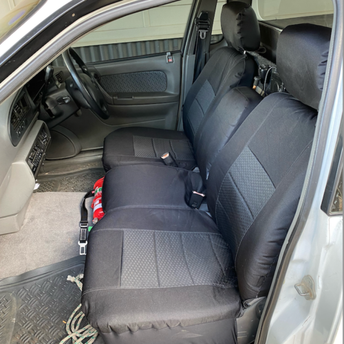 Seat covers fitted to a Ford Falcon