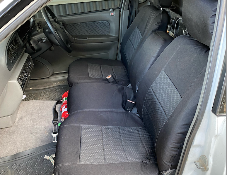 Seat covers fitted to a Ford Falcon