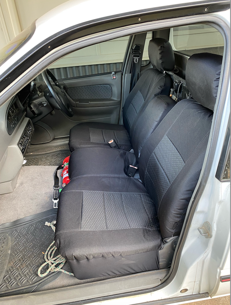 Seat covers fitted to a Ford Falcon