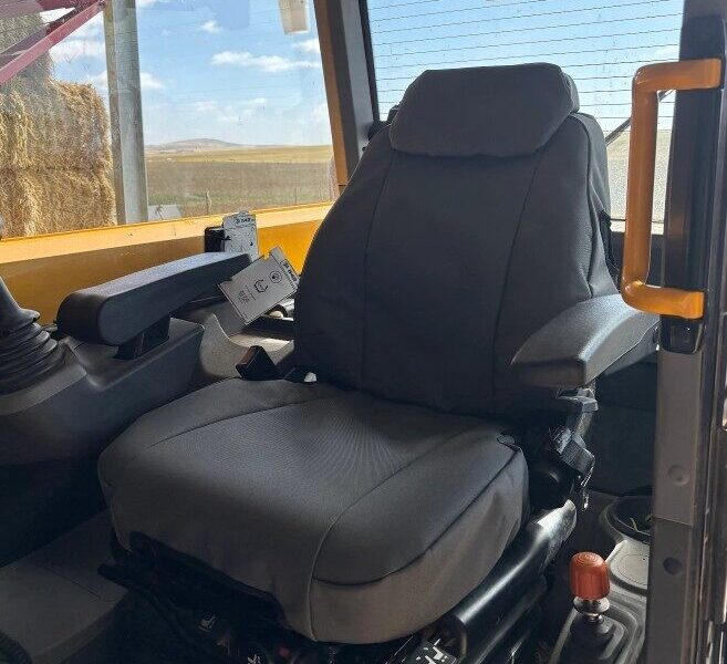 Seat covers fitted to a JCB SF383 Loadall