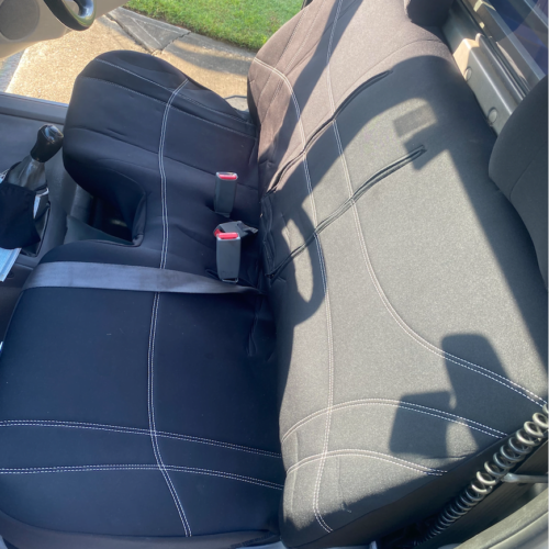 Neoprene seat covers fitted to a Nissan Navara