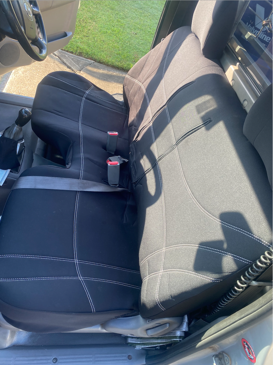 Neoprene seat covers fitted to a Nissan Navara