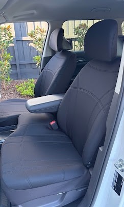 Neoprene seat covers fitted to a Kia EV5