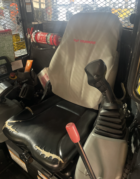 Seat covers fitted to a Yanmar Mini Excavator