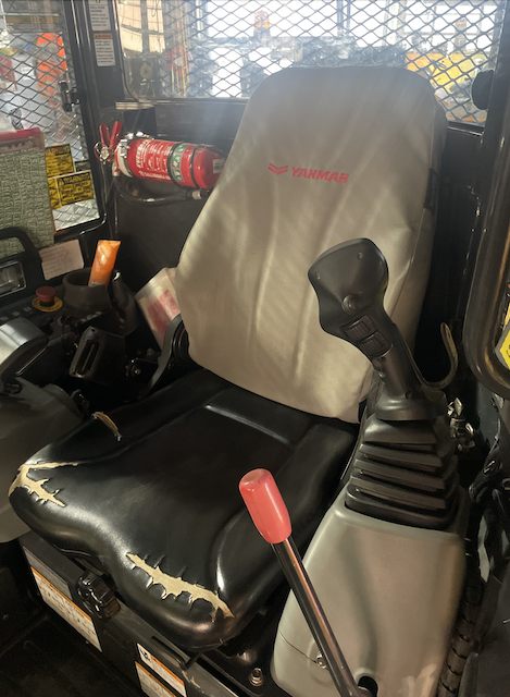 Yanmar Mini Excavator seat covers Seat covers fitted to a Yanmar Mini Excavator