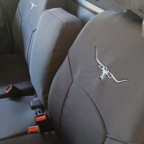 Seat covers fitted to a Ford Falcon