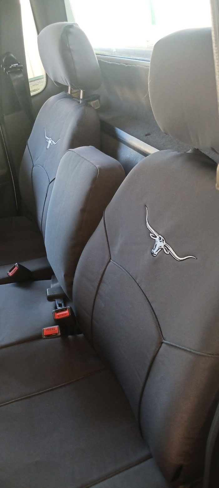 Seat covers fitted to a Ford Falcon