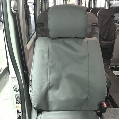 Seat covers fitted to a Toyota Coaster