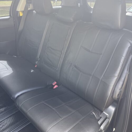 Seat covers fitted to a Toyota Estima