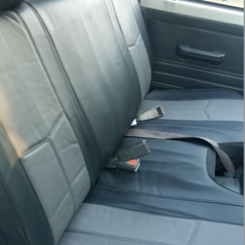 Seat covers fitted to a Ford Courier