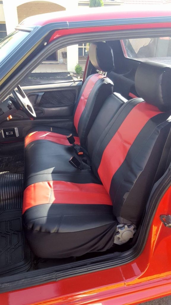 Seat covers fitted to a Ford Falcon